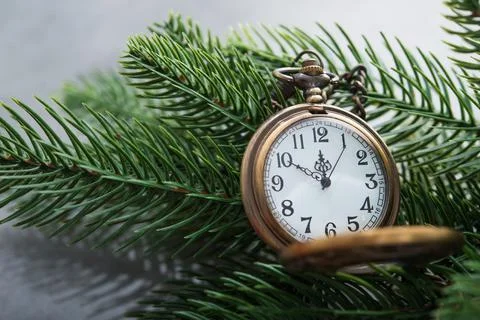 The golden clock, whose arrow are about twelve o'clock New Year celebration Stock Photos