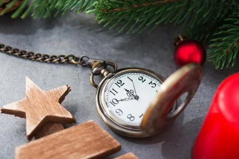 The golden clock, whose arrow are about twelve o'clock New Year celebration Stock Photos