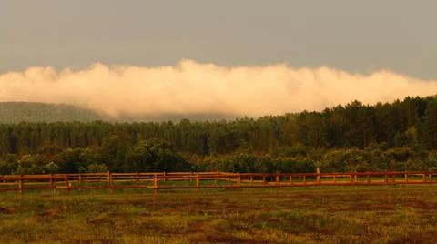 Golden cloud over the mountain Stock Photos