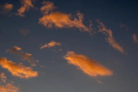 Golden Clouds in the Evening Sky 库存照片
