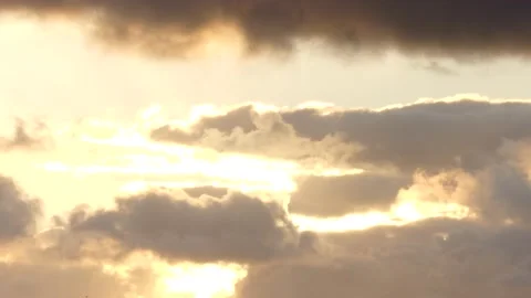 Golden clouds with sun behind - Real Time Sky - natural Cloudscape Stock Footage 139386926