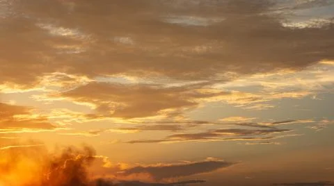 Golden Clouds at Sunset 스톡 사진