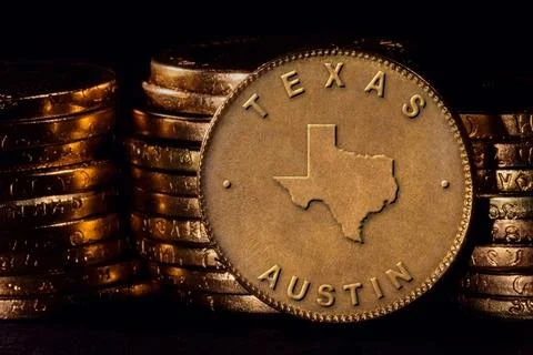 Golden Coin with Map of Texas Stock Photos