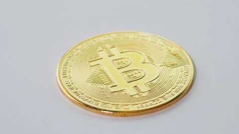 Golden coins with bitcoin symbol on stack of coins isolated on white background. Stock Footage 149954765