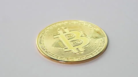 Golden coins with bitcoin symbol on stack of coins isolated on white background. Stock Footage 150004377