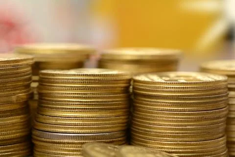 Golden Coins Stack making a Financial background Stock Photos