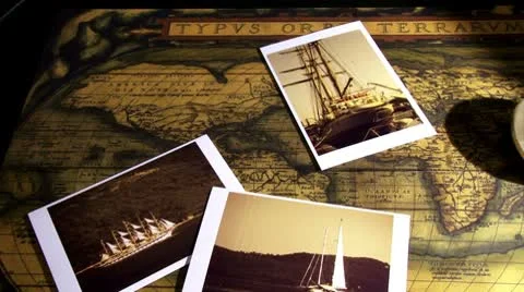 Golden compass and old maps - pan right Vídeo Stock 8946785