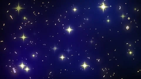 Golden confetti falling against a deep blue background with glowing star light Stock Footage 345854146
