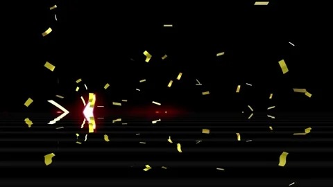 Golden confetti particles falling against a dark black background with glowing 스톡 동영상 346339797