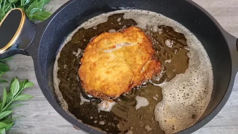 Golden Crispy Fried Chicken Breast Cutlet | Homemade Breaded Chicken Frying i Stock Footage 344643906