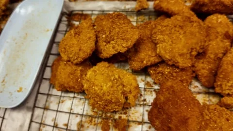Golden Crispy Fried Pork Cutlets Close Up Street Food Texture Thailand 4K Stock Footage 332340896