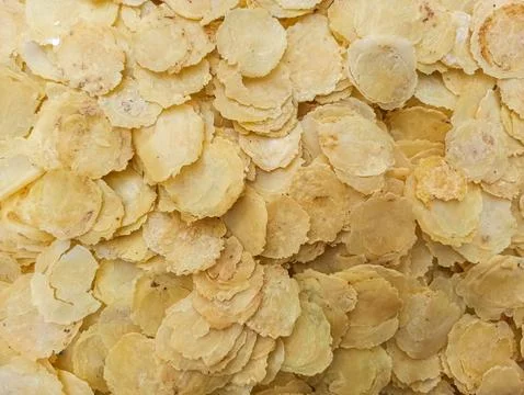 Golden, crispy, thin rounds piled together Stock Photos