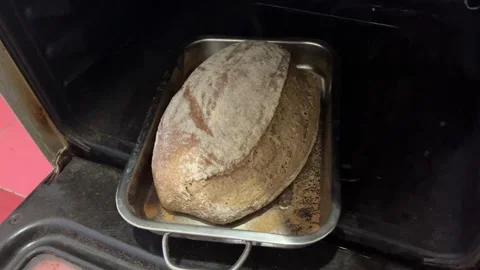 Golden crust bread in oven freshly baked loaf Stock Footage 334330448