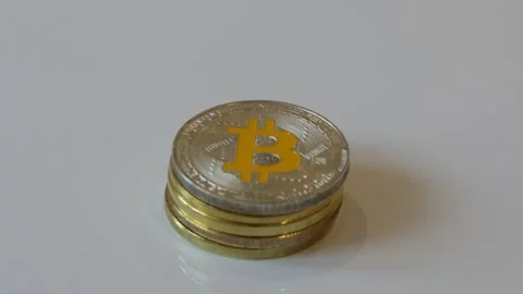 Golden cryptocurrency close up on a light background Stock Footage 102836318