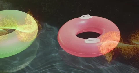 Golden currents materializing around green red tubes, swirling fading to accent Stock Footage 317183544