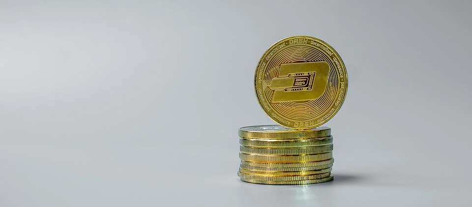 Golden Dash cryptocurrency coin stack, Crypto is Digital Money within the blo Stock Photos