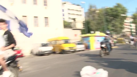 Golden Dawn mottorcade with flags Stock Footage 148411252