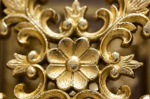 Golden decorative element with floral pattern. Design element  Stock Photos