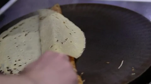 A golden, delicate pancake. Stock Footage 296549839