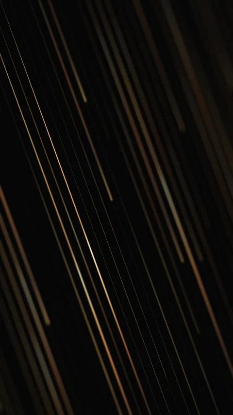 Golden diagonal light streaks drifting across deep black space. Elegant met.. Stock Footage 329051067