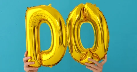 Golden DO word made of inflatable balloons Video stock 113460393