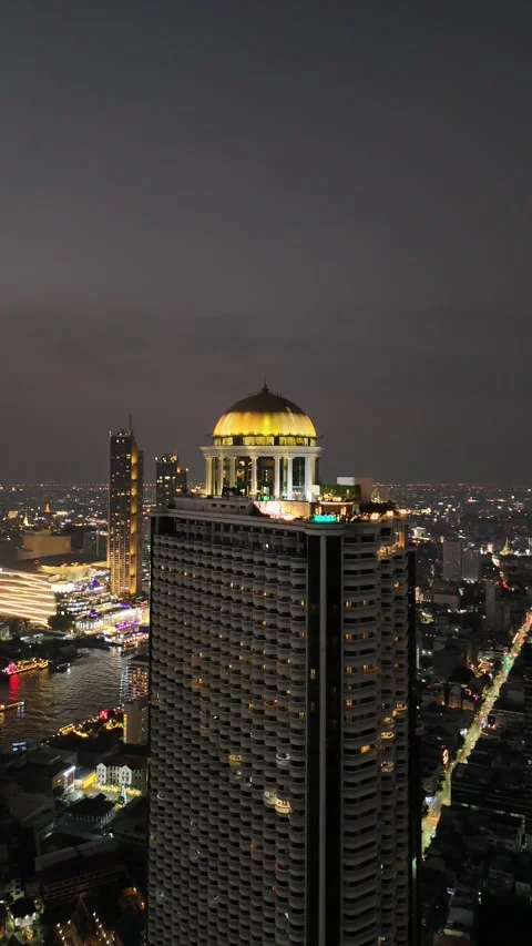Golden Dome Rooftop Skyscraper at Night in Bangkok, Thailand Stock Footage 335970605