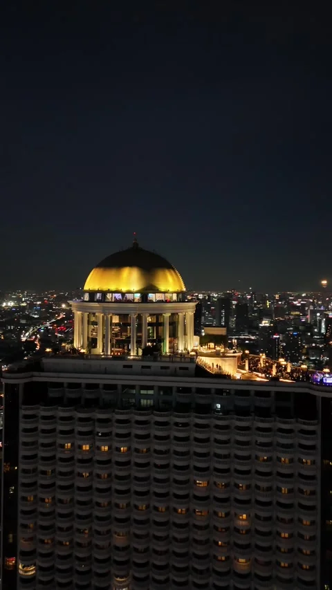 Golden Dome Skyscraper Rooftop Bar at Night in Bangkok, Thailand Stock Footage 335838853