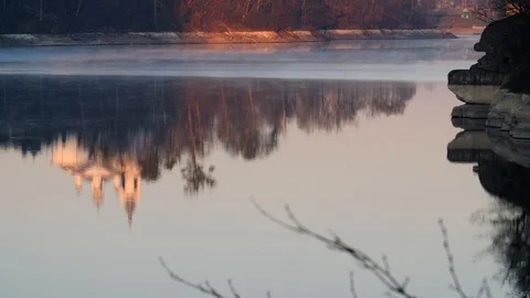 The Golden domes of the monastery are reflected in the water Stock Footage 128328659