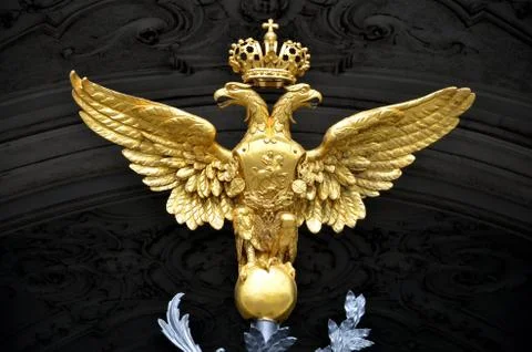Golden double headed eagle as a russian national emblem Stock Photos