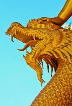 Golden dragon statue Stock Photos
