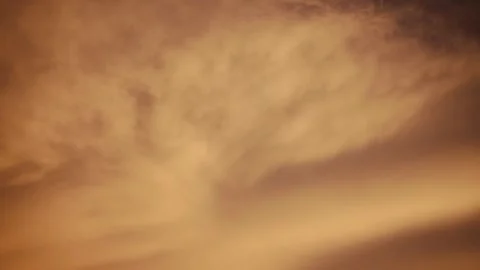 Golden Dramatic Cloud Formation Filling the Evening Sky Stock Footage 340266221