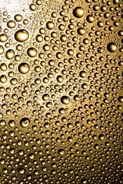 Golden drops Stock Photos
