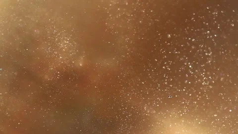 Golden dust liquid gold texture with  sparkling particles. Vidéo 335034480