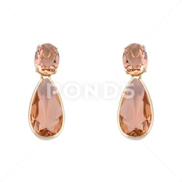 Golden earrings with gemstone isolated on white background Stock Photos