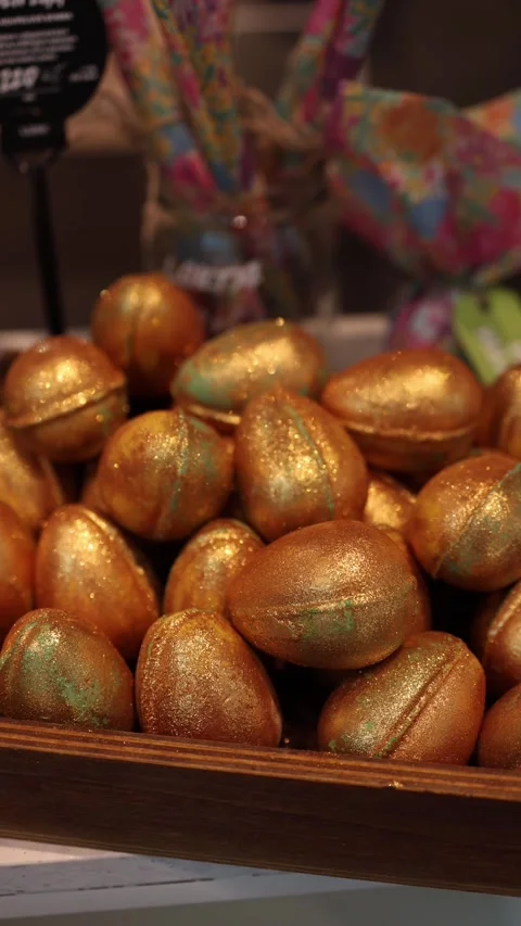 Golden easter bath bomb eggs display Video stock 332163731
