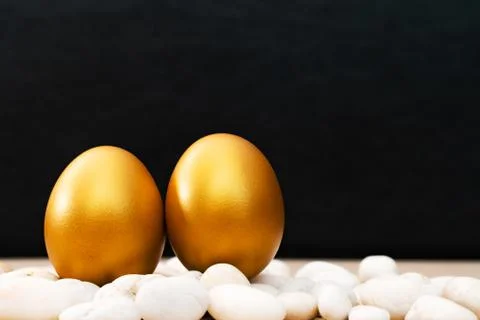 Golden Easter egg, happy Easter sunday hunt holiday decorations Stock Photos