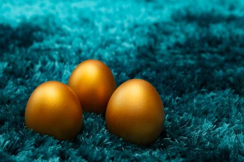 Golden Easter egg, happy Easter sunday hunt holiday decorations Stock Photos