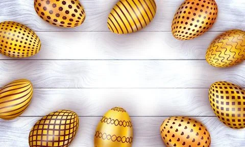 .Golden Easter eggs on light wooden background Stock Photos