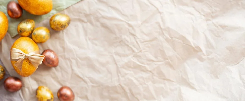 Golden easter eggs on paper Stock Photos