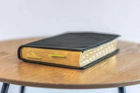 Golden edged Bible with tabs. Devotional journal. Stock Photos
