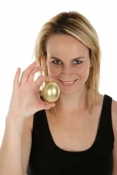 Golden Egg Saving Concept Stock Photos