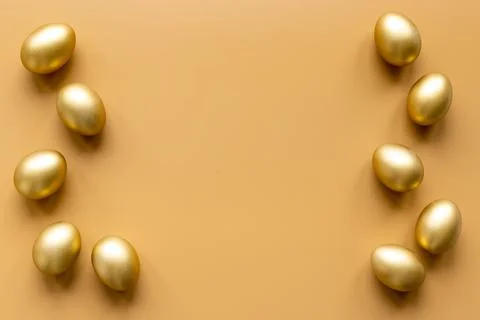 Golden eggs. Easter decoration background. Top view Stock Photos