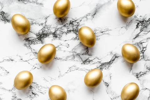 Golden eggs. Easter decoration background. Top view Stock Photos