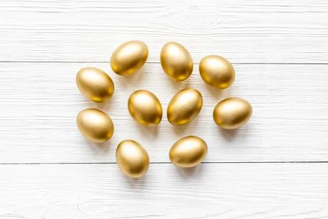 Golden eggs. Easter decoration background. Top view Stock Photos