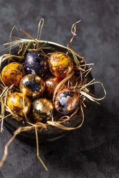 Golden eggs in nest. Easter eggs. easter decoration Stock Photos