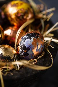 Golden eggs in nest. Easter eggs. easter decoration Stock Photos