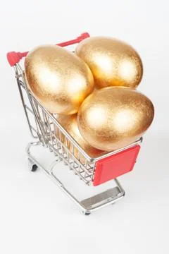 Golden eggs Stock Photos