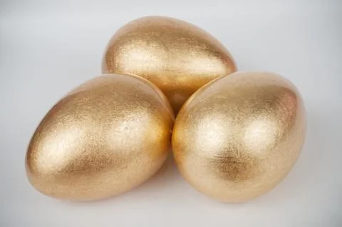 Golden eggs Stock Photos