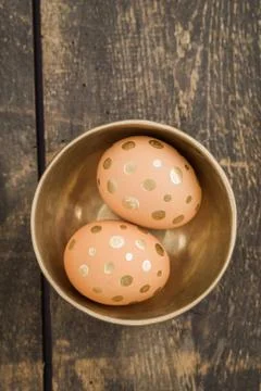 Golden eggs Stock Photos