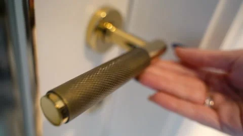 Golden Elegance: Door Handle Close-Up Stock Footage 306574108